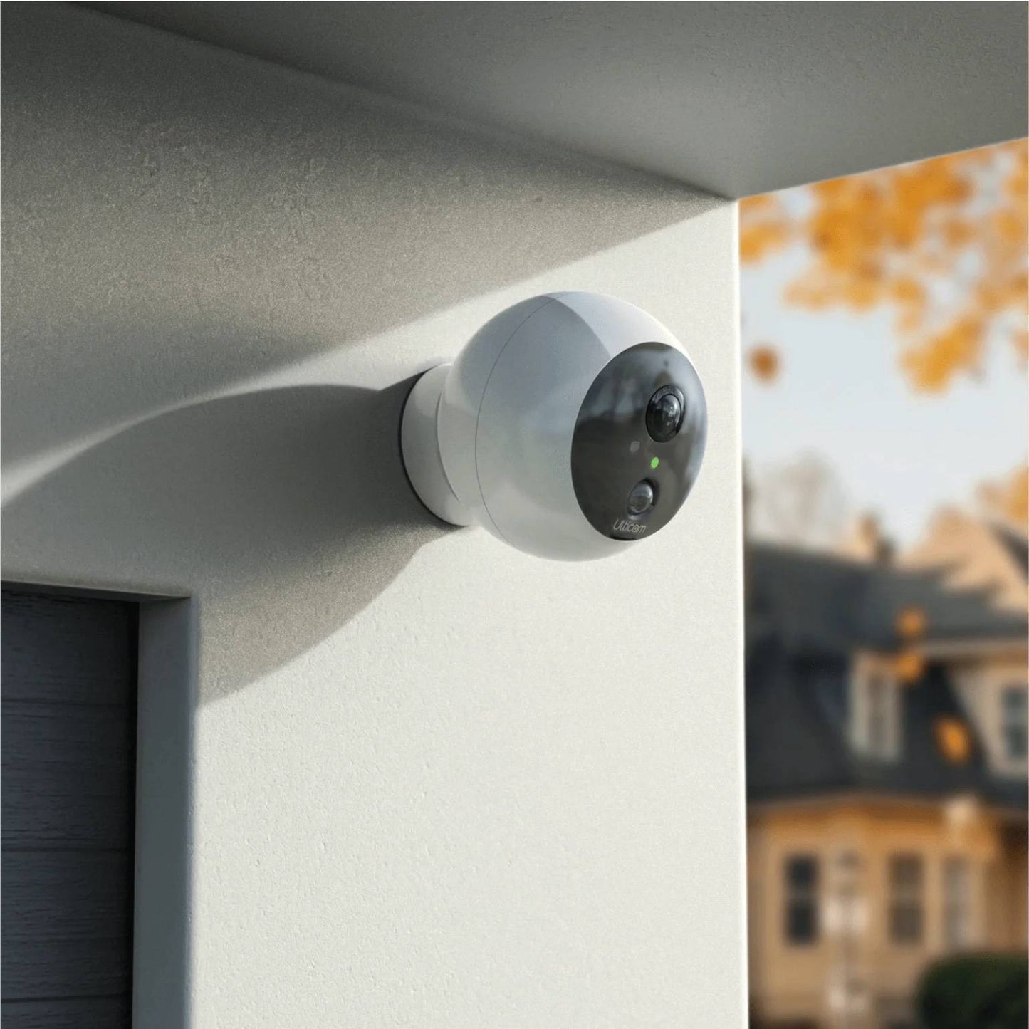 Ulticam Dot 4-Pack Smart Security Camera mounted outdoors – wireless WiFi home surveillance with AI motion detection and night vision.
