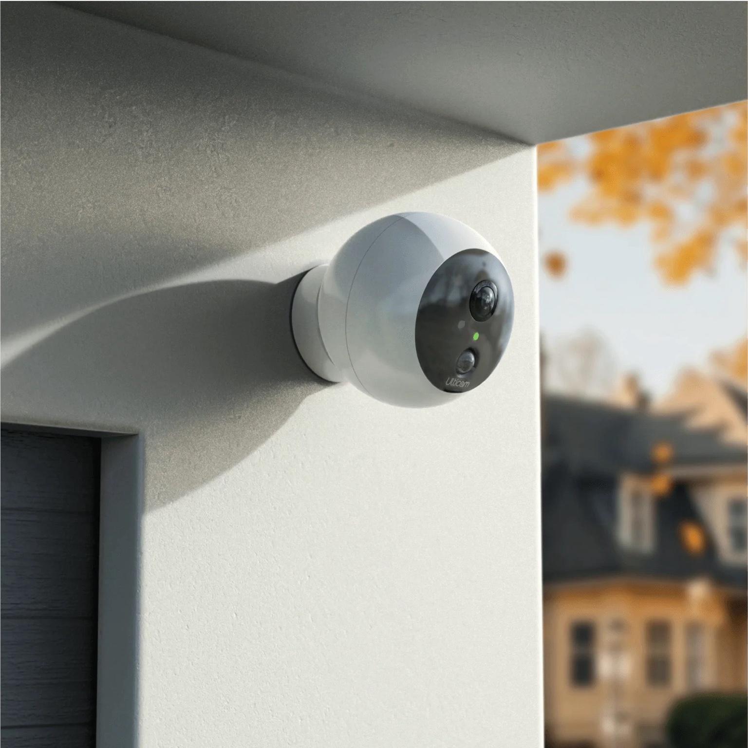 Ulticam Dot 2K UHD Wireless Security Camera Kit – Smart WiFi outdoor security camera with AI motion detection and night vision, wall mounted.