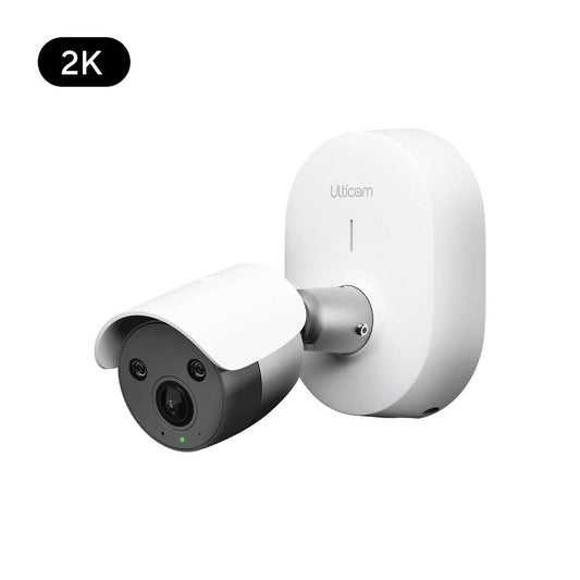 Ulticam IQ 2K UHD Smart Security Camera – compact indoor/outdoor WiFi surveillance camera with AI detection and night vision, wall-mounted design in white finish.